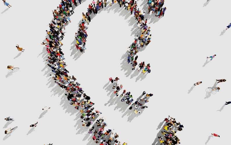 Embracing Change in Audiological Treatment: Over-the-Counter Hearing Devices Photo of crowd of people depicting an ear