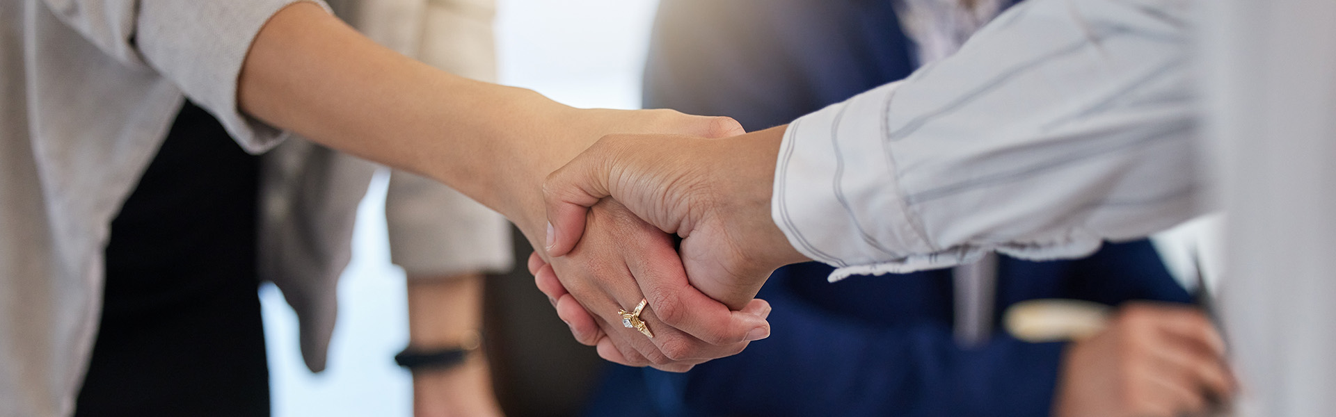 People shaking hands / shutterstock.com